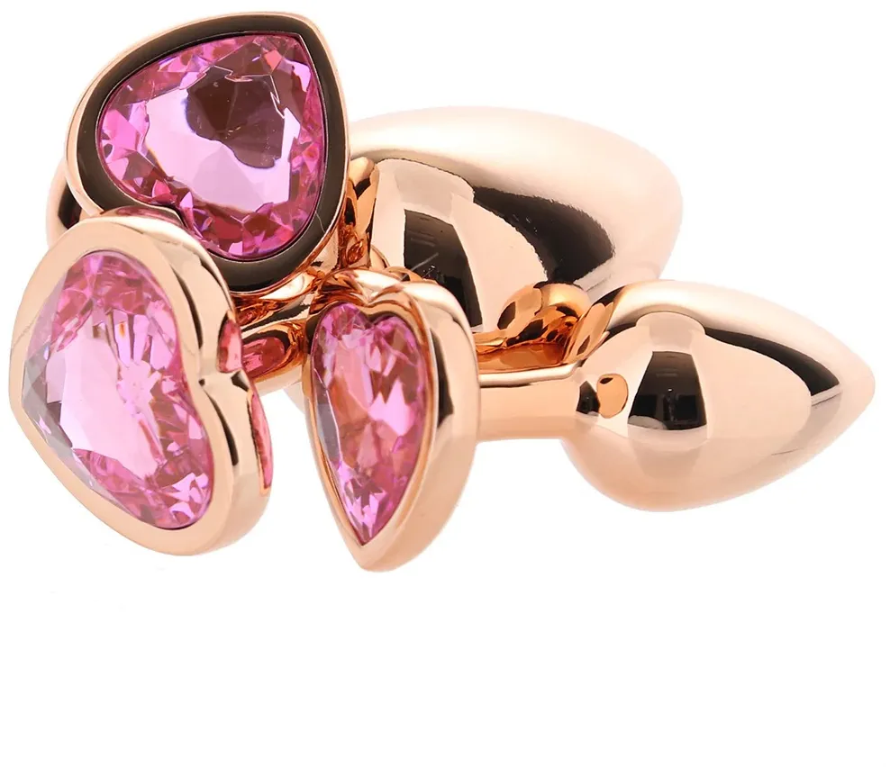 алюминиевая анальная пробка "розовое золото" с розовым кристаллом в форме сердца (размер l) в Краснодаре